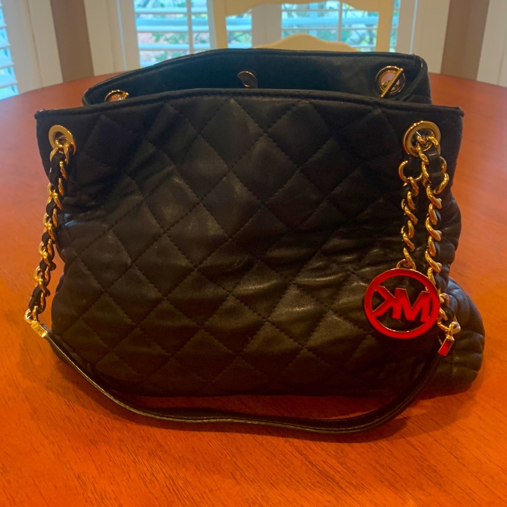 Michael kors black lamb leather quilted handbag